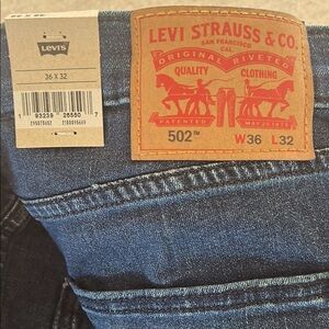 Levi's 502 Denim Jeans with Leather Patch